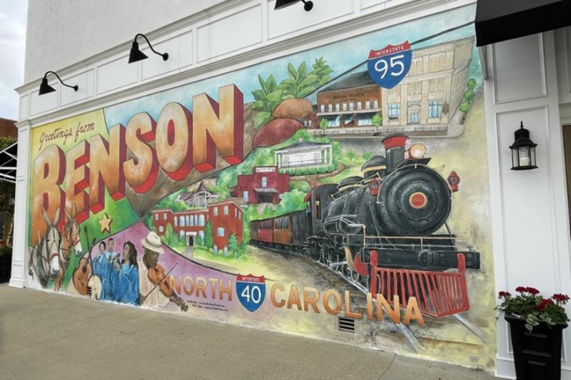 Downtown Benson mural showcasing local history in North Carolina.
