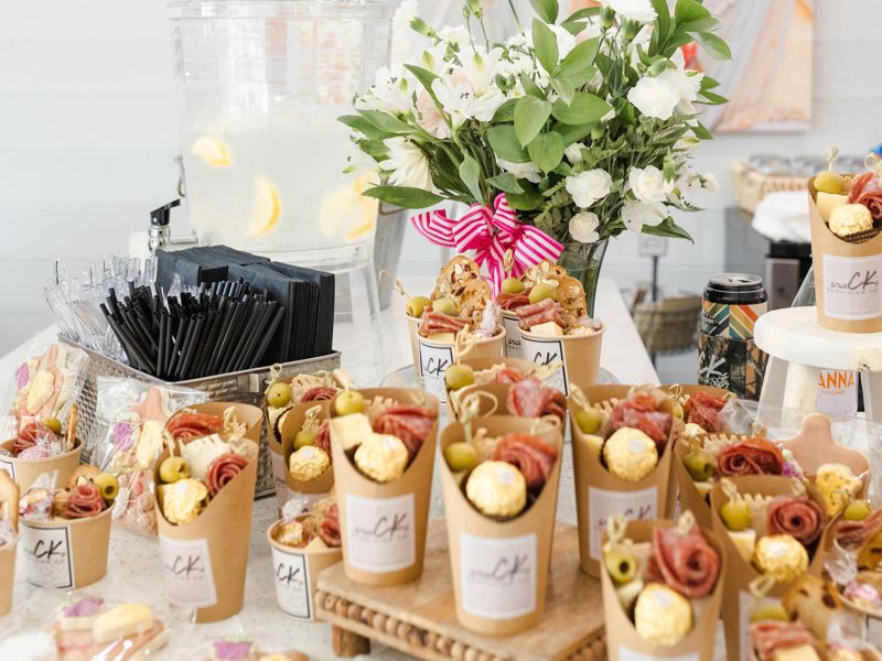 Charcuterie snack cups and catering display from Clayton Snacks Provision Company