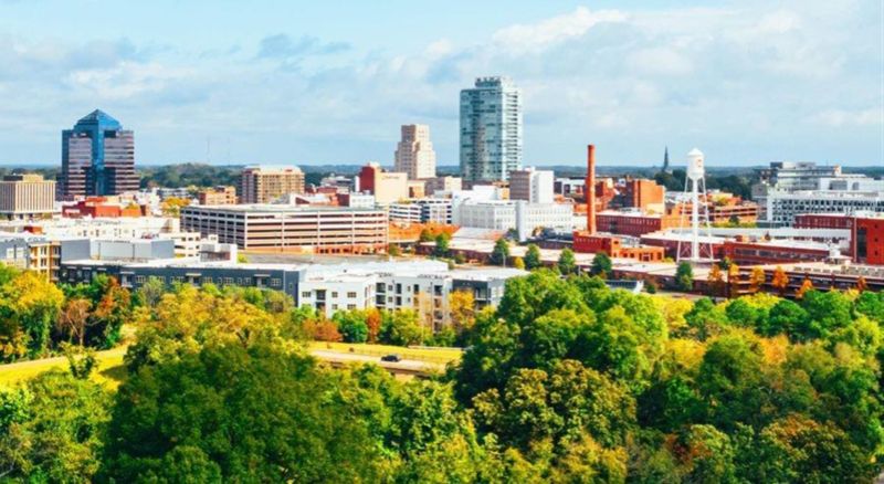 Aerial skyline view of downtown Durham North Carolina with urban buildings