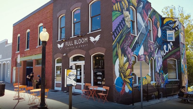 Full Bloom coffee shop storefront with mural in downtown Garner North Carolina