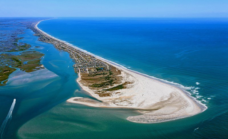 Aerial view of Topsail Island coastline with inlet and ocean waters near Hampstead, NC