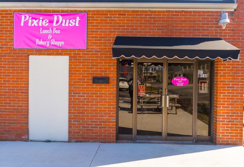 Pixie Dust Lunch Box and Bakery Shoppe storefront with brick exterior in Selma, North Carolina.